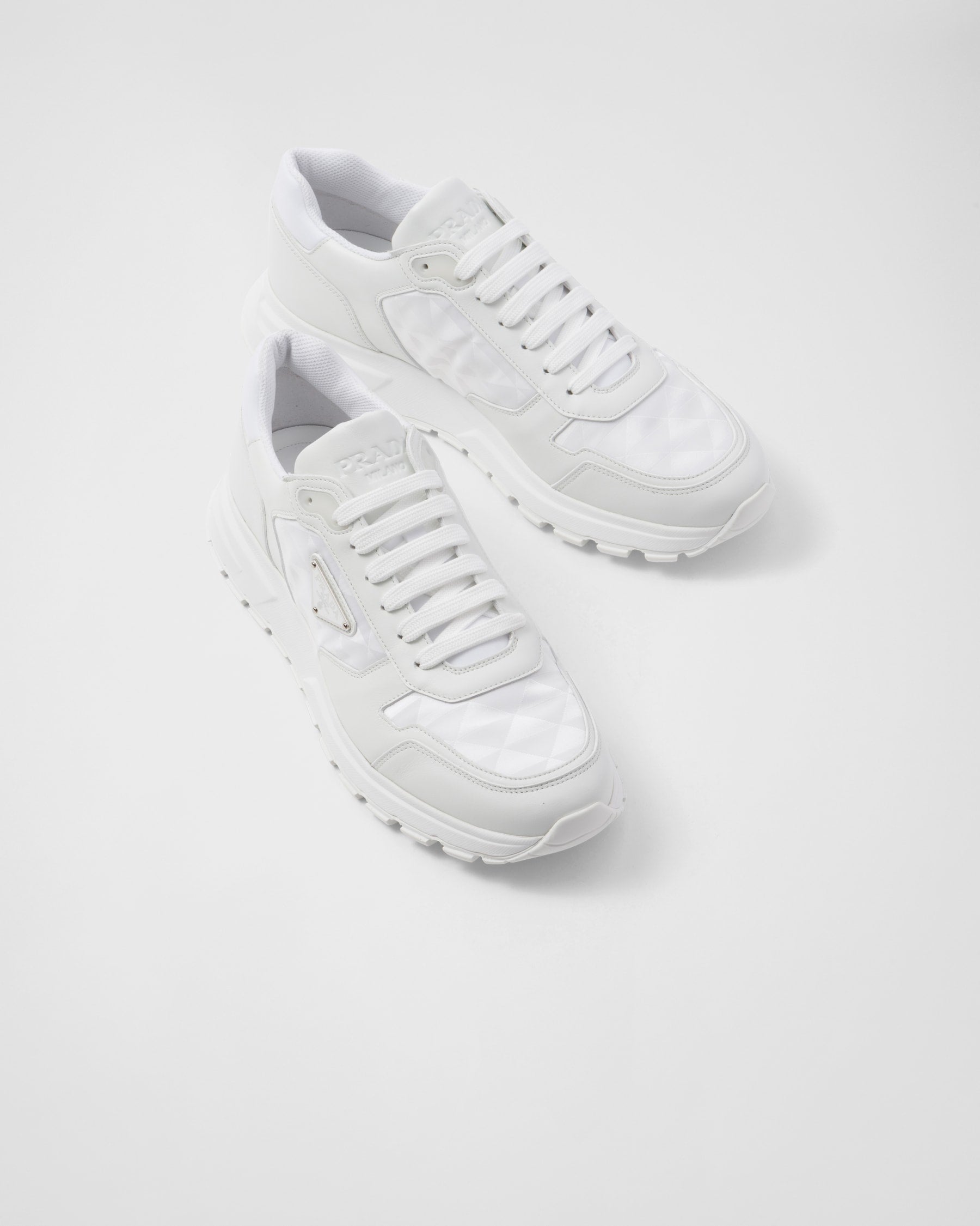 Prada montantes en cuir et Re-Nylon